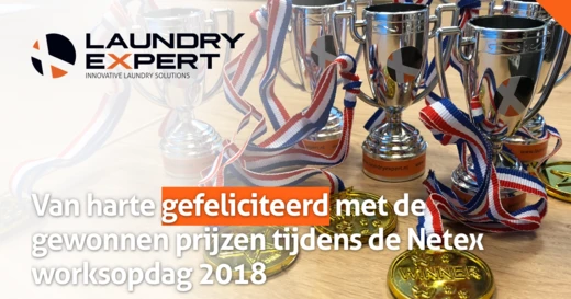 Bekers en medailles met tekst over gewonnen prijzen tijdens Netex-dag 2018